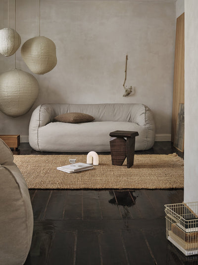 ferm LIVING Vuelta Portable Lamp lifestyle on the floor with Silva Piece