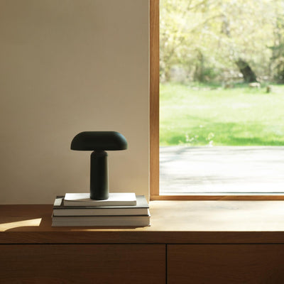 Normann Copenhagen Porta Table Lamp lifestyle. Free UK delivery from someday designs. #colour_dark-green