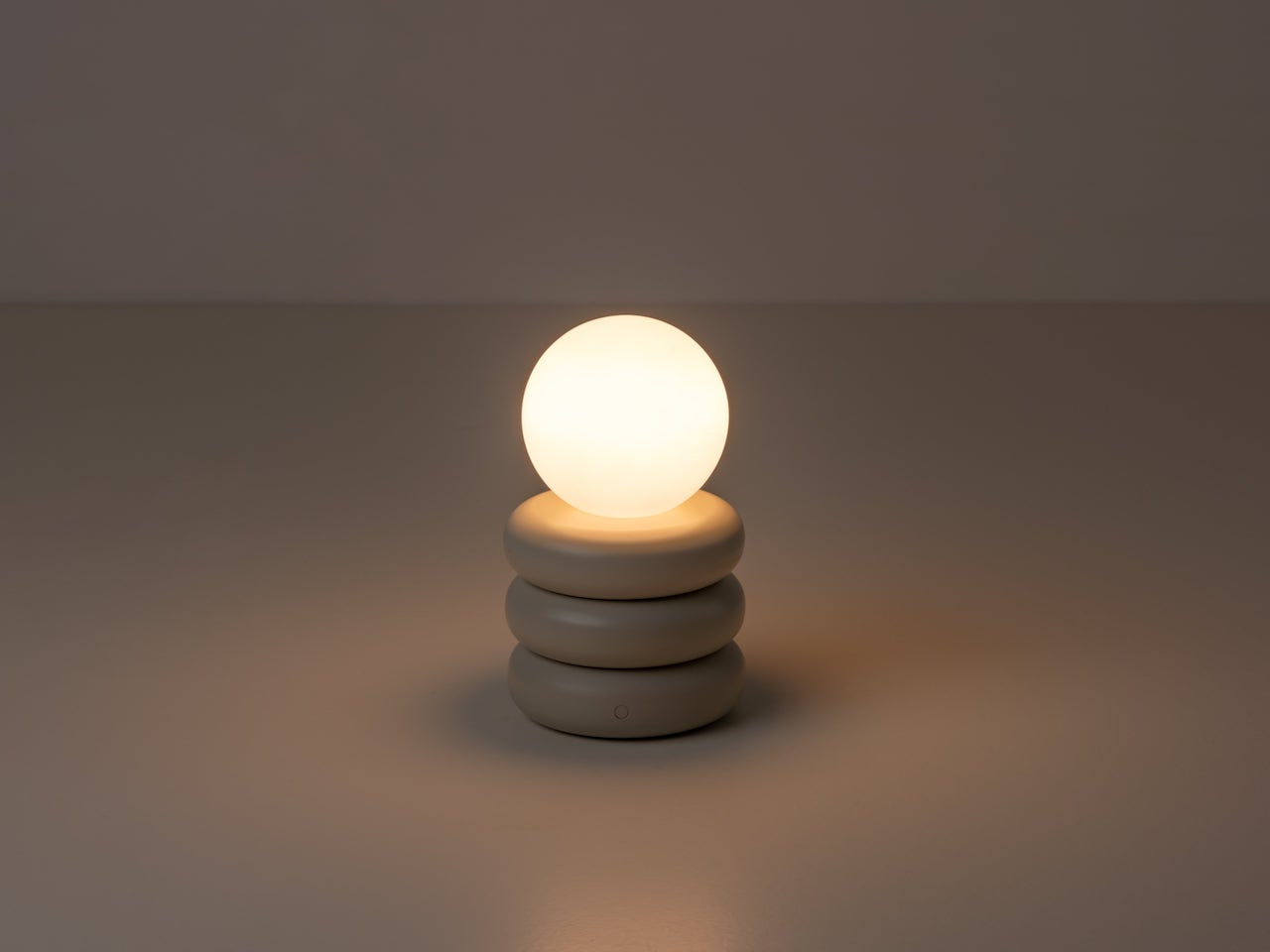 Houseof Tube Cordless Table Lamp  product shot on dim #colour_sand